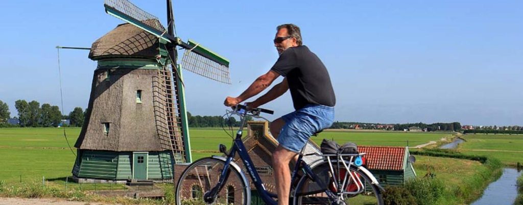 _data_pic_Holland_boatbike_nordholland_Radfahrerwindmill_MG_6613_jpg.1412892000.1440x663x75.crop